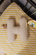Boucle letter cushion H teddy letter pillow by bettys home lying in children crib next to maileg mouse and little lights rainbow