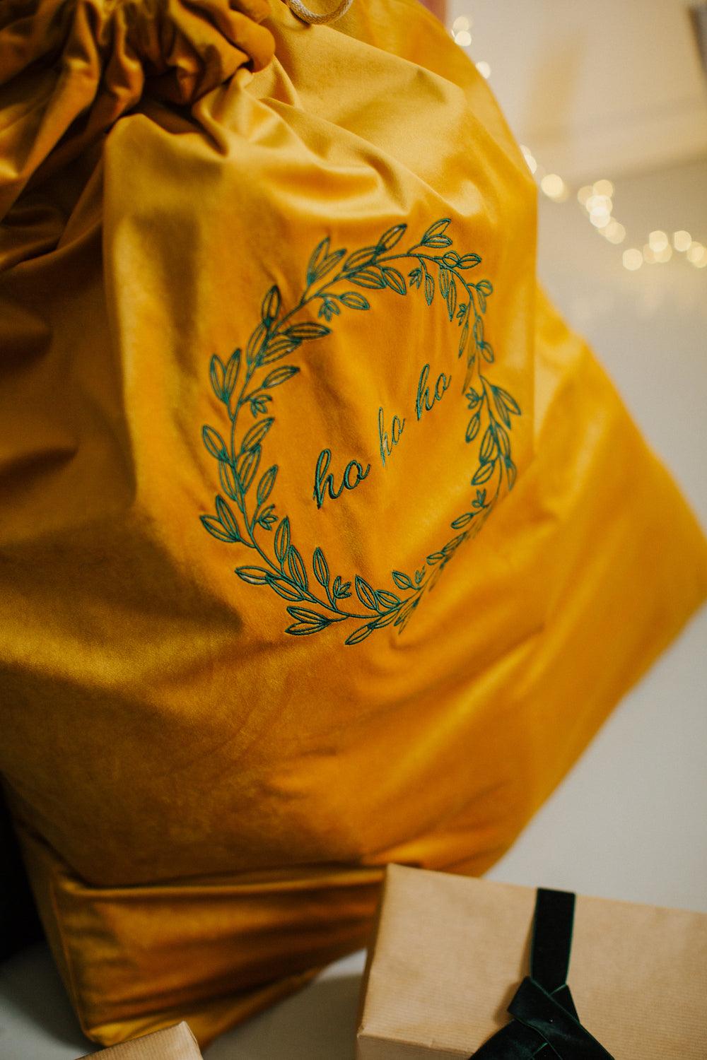 Yellow Christmas Gift Bag with embroidered ho ho ho by Bettys Home